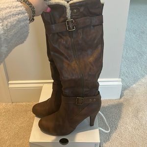 Call it Spring brown heeled boots with fur on top lining.
